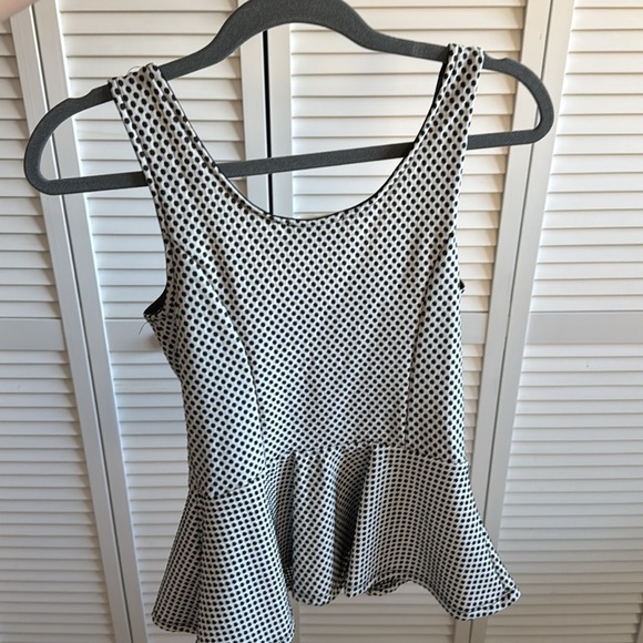 Stretchy white and. Lack polka dot peplum top - Picture 2 of 4